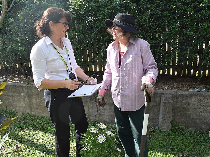 Janine Hoult with client in garden